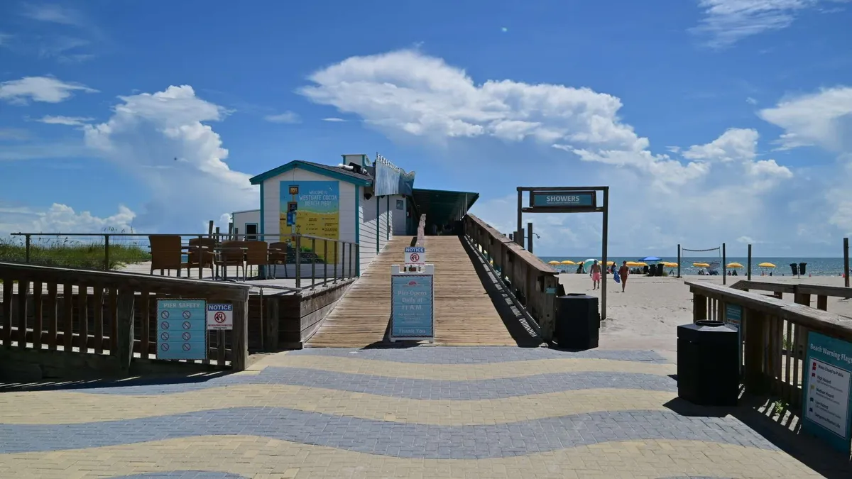 The beach-access ramp crossing the dunes