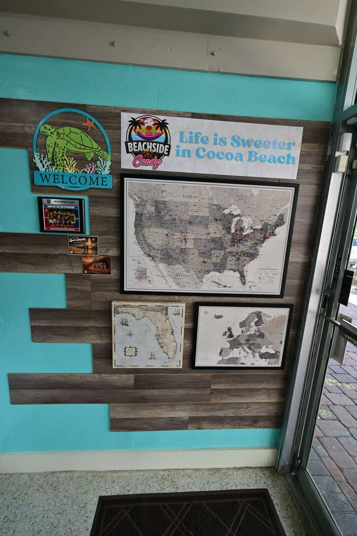 A “Life is Sweeter in Cocoa Beach” map wall